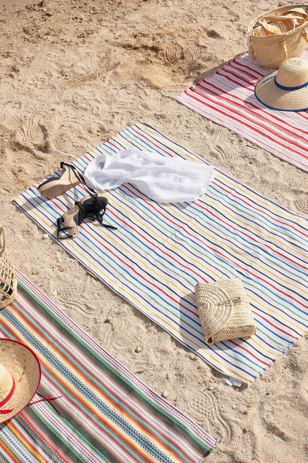 15 toallas pareo (de El Corte Inglés y La Redoute) para triunfar en la playa  este verano que puedes usar también de vestido o falda