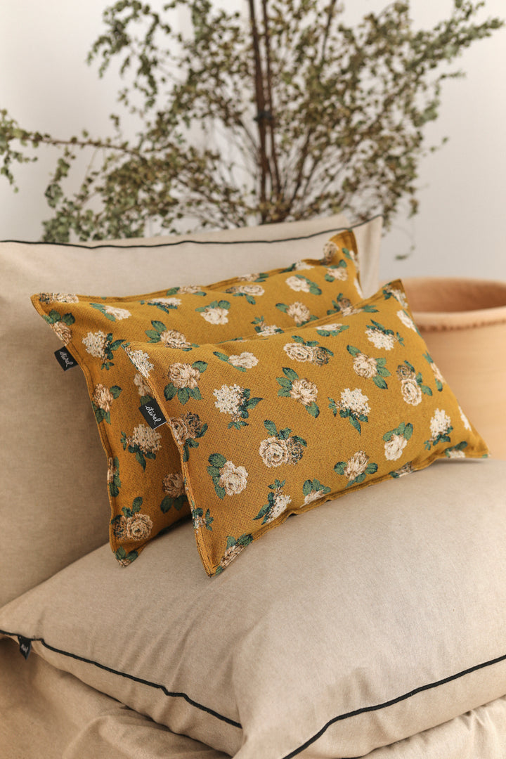Funda cojín tejido jacquard flores rosas
