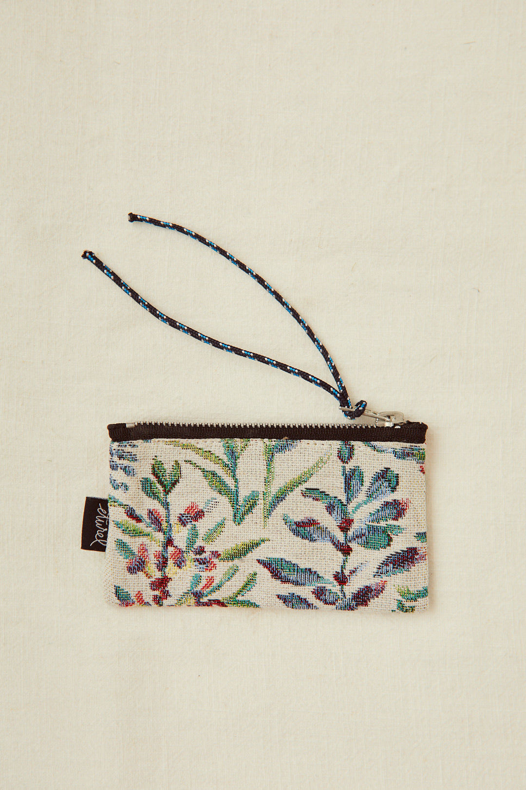 Monedero tejido jacquard flores azaleas