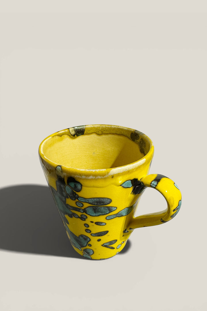 Taza salpicado amarillo