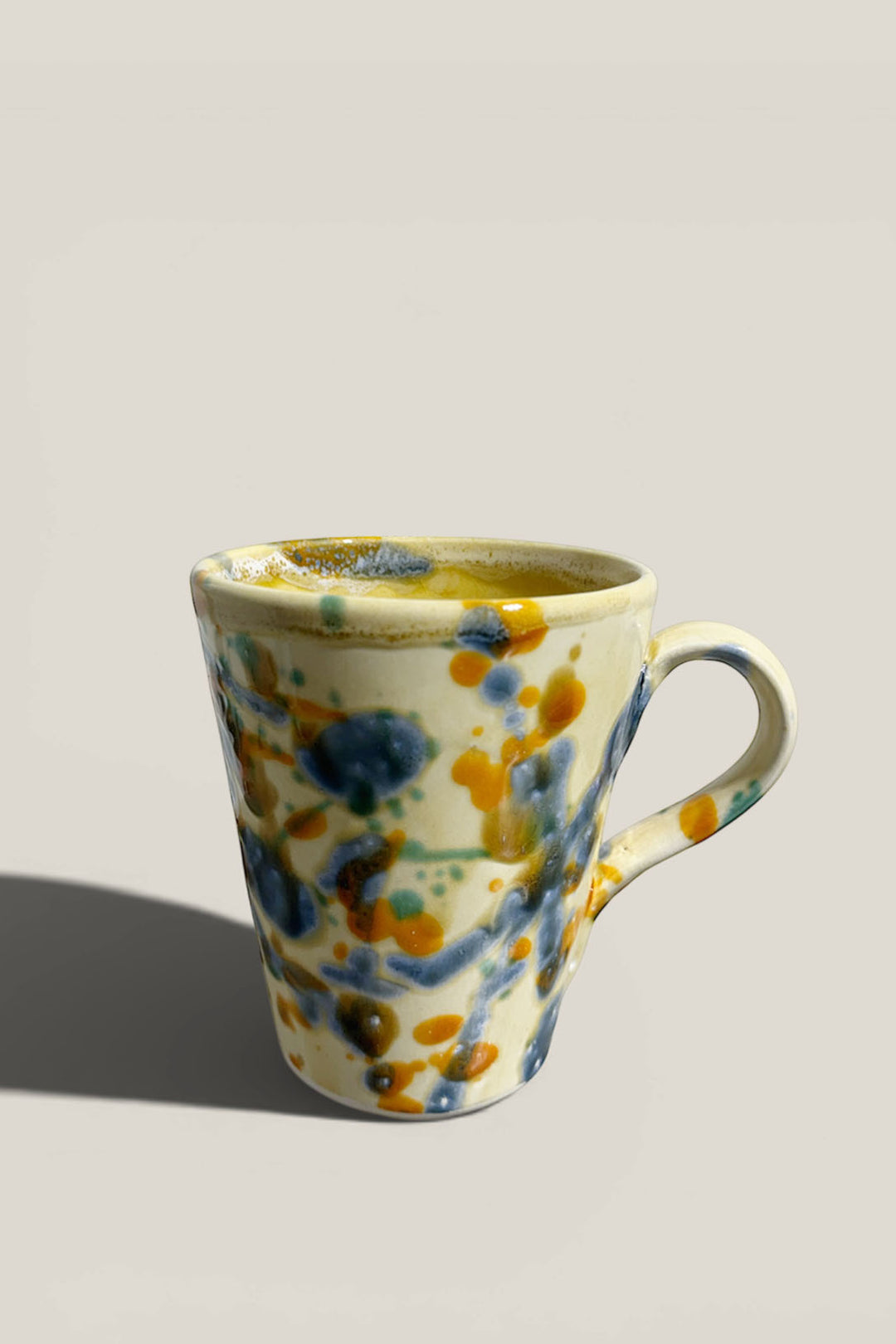 Taza salpicado azul